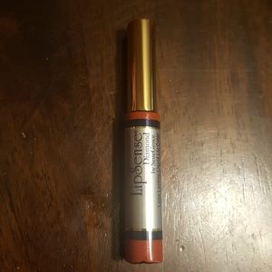 Lipsense lipgloss in crimson red diamond.